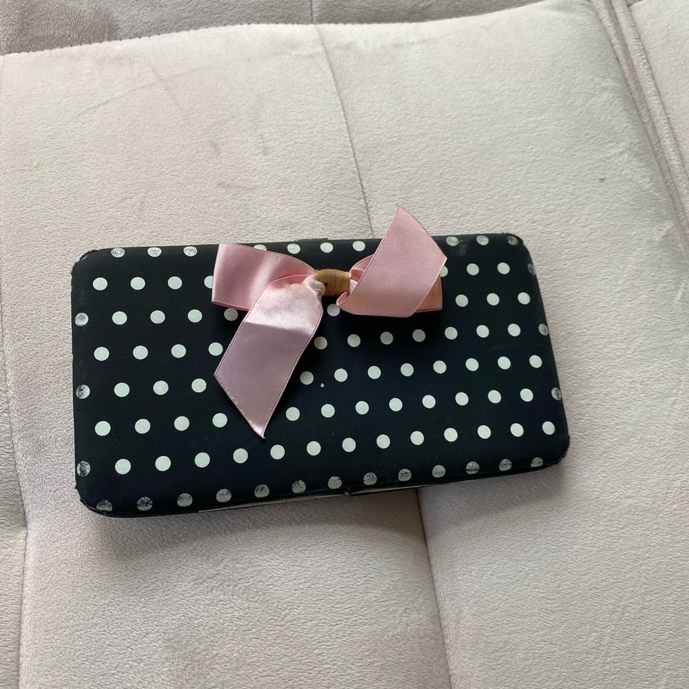 Gently used wallet with pink bow